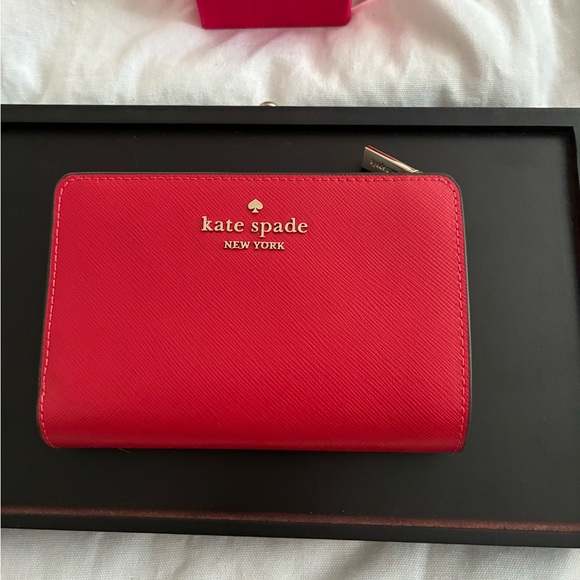 kate spade Handbags - Kate Spade Vibrant Red Zip Wallet
